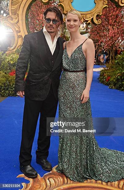 Johnny Depp and Mia Wasikowska attend the European Premiere of "Alice Through The Looking Glass" at Odeon Leicester Square on May 10, 2016 in London,...