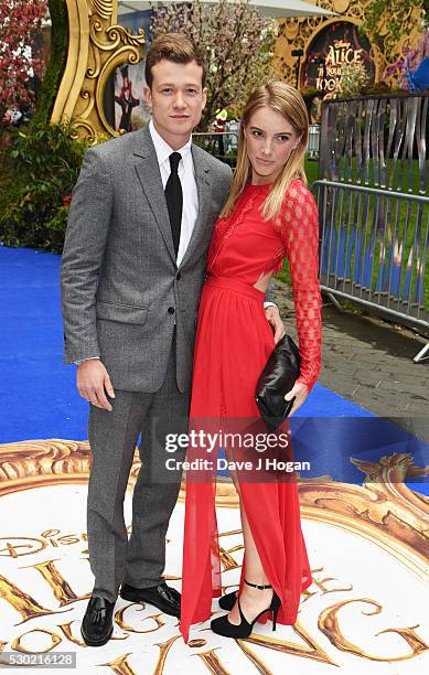 Ed Speleers and Asia Macey attend the European Premiere of "Alice Through The Looking Glass" at Odeon Leicester Square on May 10, 2016 in London,...