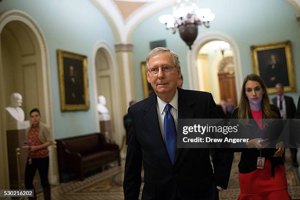 Senate Majority Leader Mitch McConnell walks to his office before a weekly policy meeting with Senate Republicans, at the U.S. Capitol, May 10 in...