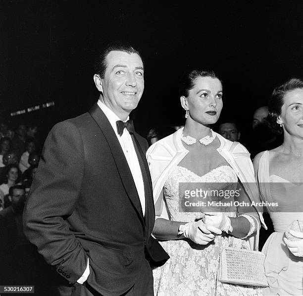 Actor Robert Taylor and wife Ursula Thiess attend the premiere of "King and I" in Los Angeles,CA.