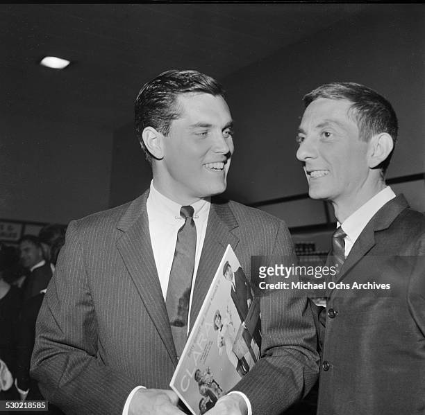 Writer/Producer Aaron Spelling and friend actor Jeffrey Hunter attend a party in Los Angeles,CA.