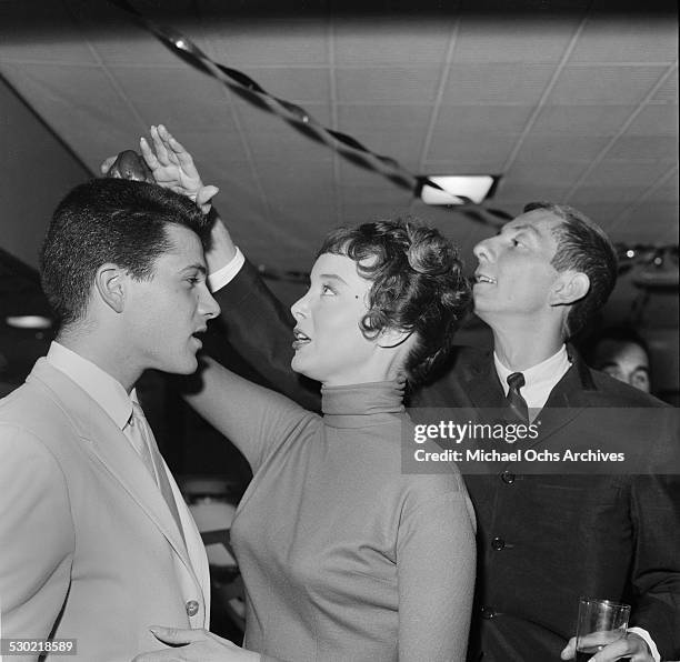 Writer/Producer Aaron Spelling and friends attend a party in Los Angeles,CA.