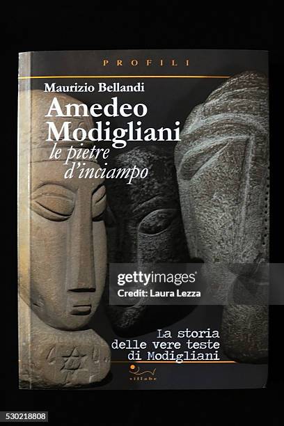 The book 'Amedeo Modigliani. Le pietre d'inciampo. La storia delle vere teste di Modigliani' written by Maurizio Bellandi and edited by Sillabe is...