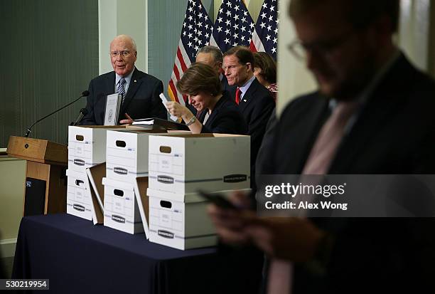 Ranking member of U.S. Senate Judiciary Committee Sen. Patrick Leahy speaks to members of the media during a press availability with Sen. Amy...