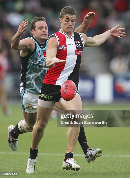 Matt Maguire for St Kilda and Matthew Primus for Port in action during the AFL round 11 match between the St Kilda Saints and Port Adelaide Power at...