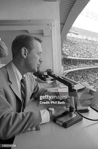 Closeup portrait of Los Angeles Dodgers announcer Vin Scully in booth during game vs Cincinnati Reds at Dodger Stadium. Los Angeles, CA 4/16/1964...