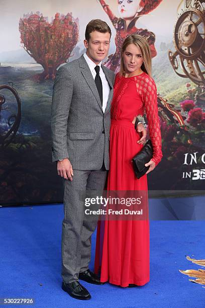 Ed Speleers and Asia Macey attend the UK Premiere of "Alice Through The Looking Glass" at Odeon Leicester Square on May 10, 2016 in London, England.