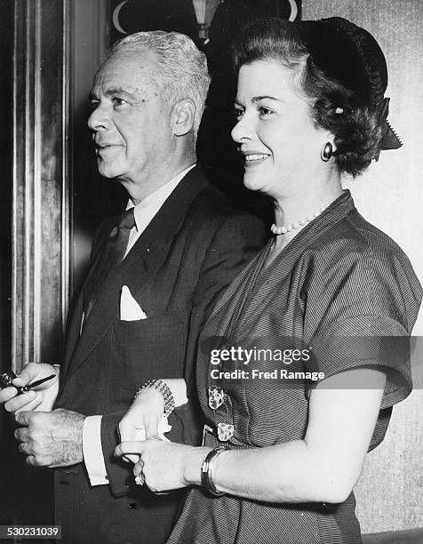 Actress Joan Bennett and her husband Walter Wanger, attending a reception at Claridge's Hotel, London, August 21st 1954.