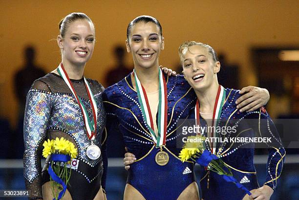 Medalist of the women's floor exercise final, Dutch Suzanne Hermes , French Isabelle Severino and French Emilie Lepennec pose on the podium in the...