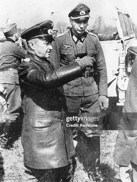 Walter Modal General Walter Model talking to another Nazi officer, in the field ...