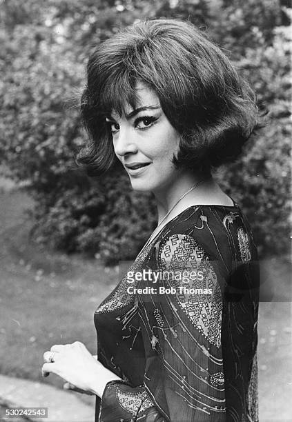 Portrait of Italian opera singer Anna Moffo in the gardens of the Savoy Hotel, London, July 13th 1967.