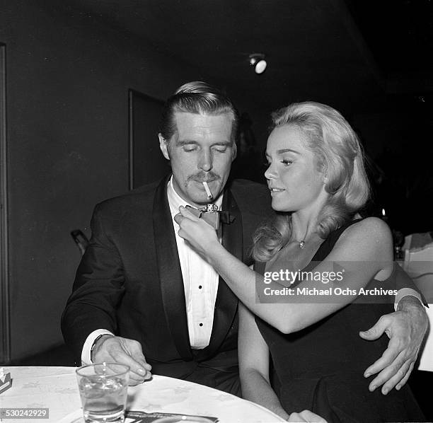 Actress Tuesday Weld with actor George Peppard attend an event in Los Angeles,CA.