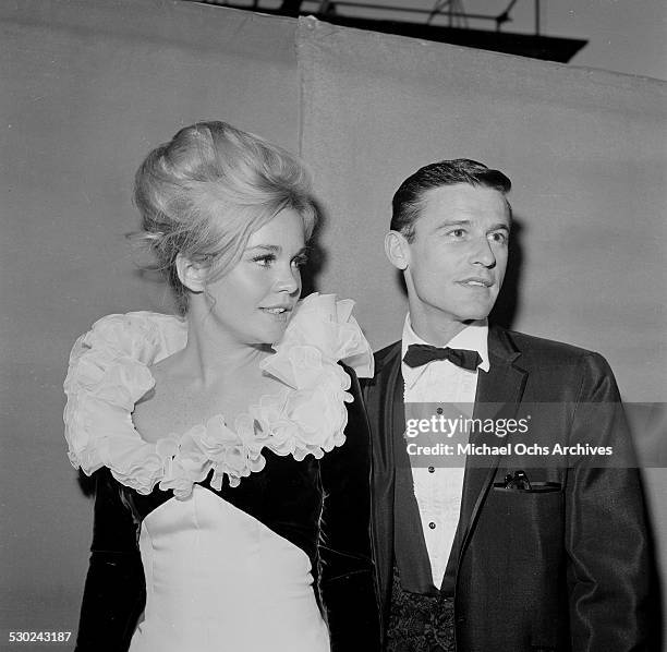 American actress Tuesday Weld and English actor Roddy McDowall attend the Academy Awards at the Santa Monica Civic Auditorium in California, USA,...