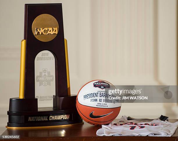 The championship trophy and gifts given to US President Barack Obama sit on a table at the White House in Washington, DC, May 10 during an event...