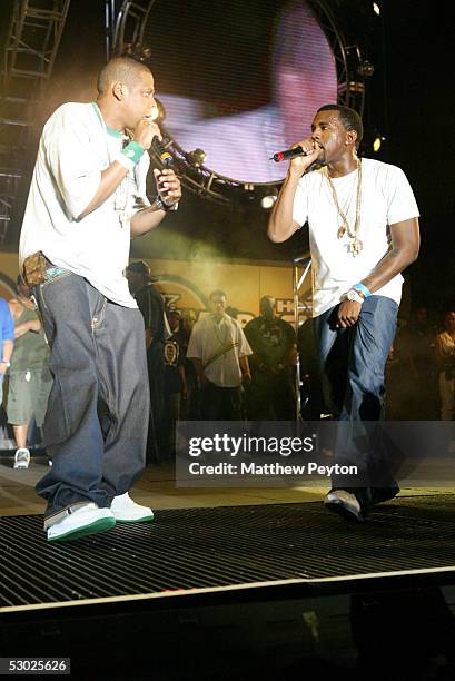 Def Jam president/rapper Jay-Z and Kanye West perform at the Hot 97 Summer Jam 2005 Concert June 5, 2005 at Giant Stadium in East Rutherford, New...