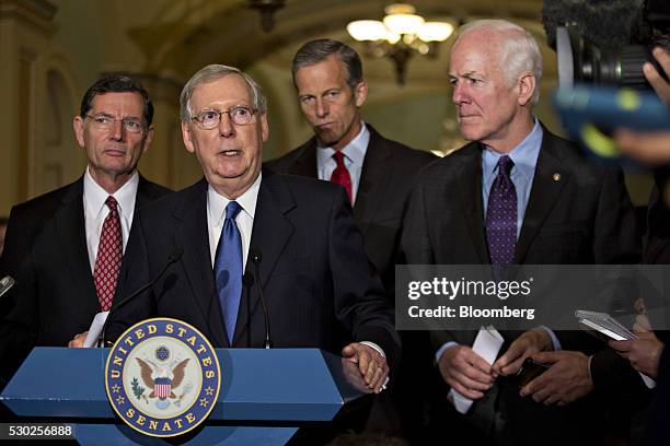 Senator John Cornyn, a Republican from Texas, from right, Senator John Thune, a Republican from South Dakota, Senate Majority Leader Mitch McConnell,...