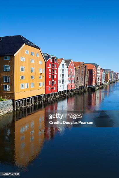 old fishing warehouses reflected in the river nidelva, trondheim, sor-trondelag, norway, scandinavia, europe - sor trondelag county stock pictures, royalty-free photos & images