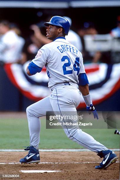 Ken Griffey Jr. #24 of the Seattle Mariners hits a home run in the top of the third inning off of Greg Maddux of the Chicago Cubs during the 63rd...