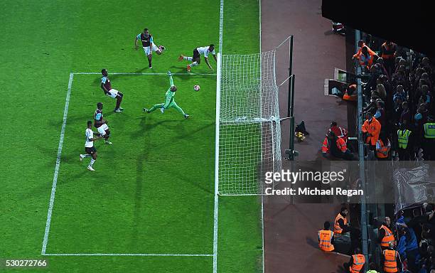 Anthony Martial of Manchester United scores their second goal past goalkeepr Darren Randolph of West Ham United during the Barclays Premier League...