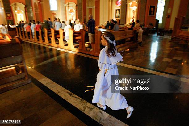 Children's attend the communion service at the Saint Peter and Paul Basilica in Bydgoszcz, Poland, on May 10 on the second day of so called white...