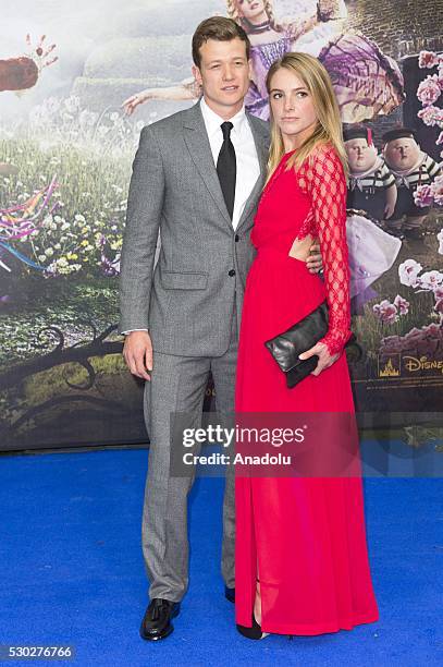 Ed Speleers and wife Asia Macey attend the European film premiere of Alice Through The Looking Glass in London, United Kingdom on May 10, 2016