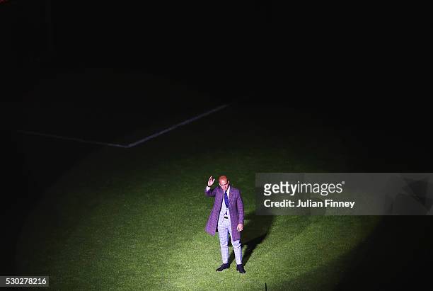 Former West Ham United player Paolo Di Canio waves to the crowd as part of the after match presentations following the Barclays Premier League match...