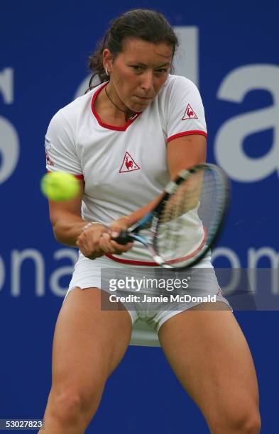 Antonella Serra Zanetti of Italy plays a backhand during her first round match against Samantha Stosur of Australia, in the DFS Classic Womens...