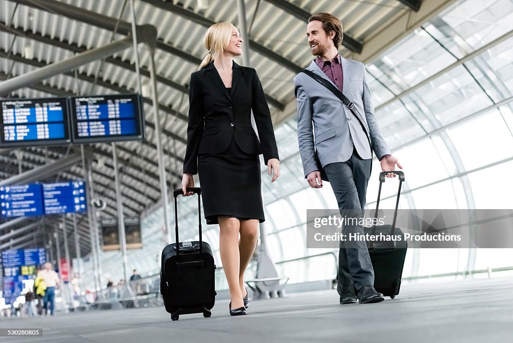 Business Travellers At The Airport