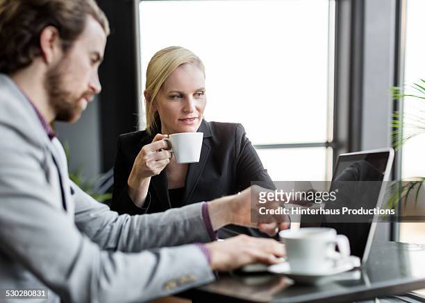 travellers having business meeting at the airport - business meeting coffee stock pictures, royalty-free photos & images