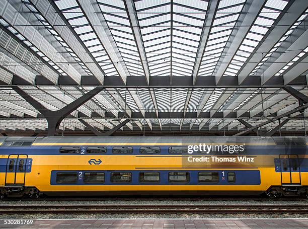 dutch train in a train station - rotterdam station stock pictures, royalty-free photos & images