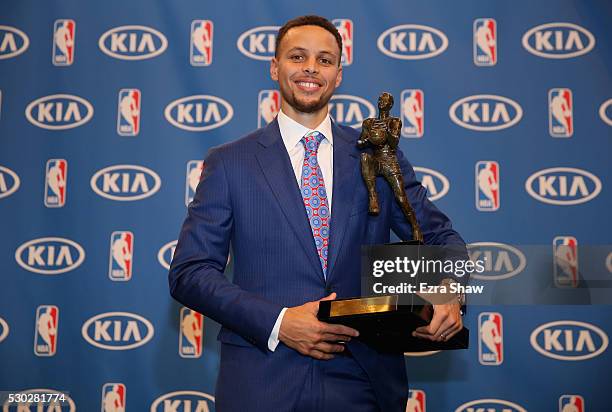 Stephen Curry of the Golden State Warriors poses with his NBA Most Valuable Player Award following a press conference at ORACLE Arena on May 10, 2016...