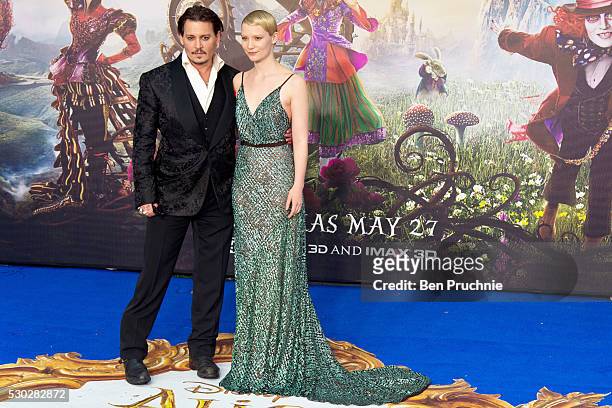 Johnny Depp and Mia Wasikowska attend the European Premiere of "Alice Through The Looking Glass" at Odeon Leicester Square on May 10, 2016 in London,...