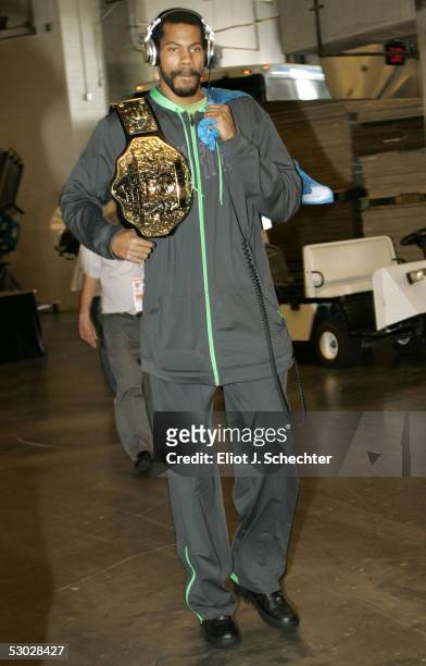Rasheed Wallace of the Detroit Pistons arrives at the arena carrying his championship belt for Game Seven of the Eastern Conference Finals against...