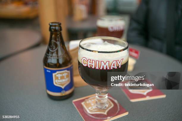 belgian trapist chimay beer at brussel christmas market in belgium - belgium beer stock pictures, royalty-free photos & images