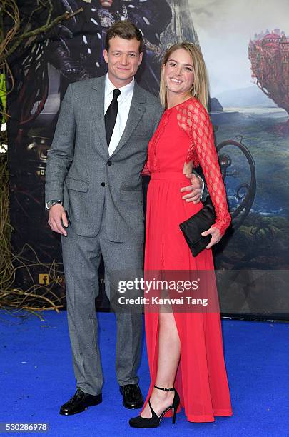 Ed Speleers and Asia Macey attend the European Premiere of "Alice Through The Looking Glass" at Odeon Leicester Square on May 10, 2016 in London,...