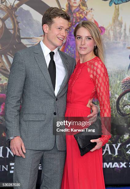 Ed Speleers and Asia Macey attend the European Premiere of "Alice Through The Looking Glass" at Odeon Leicester Square on May 10, 2016 in London,...