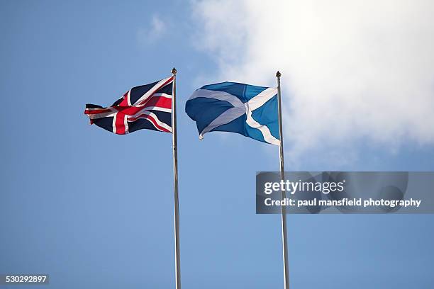 union jack and saltire flags - scotland independence stock pictures, royalty-free photos & images