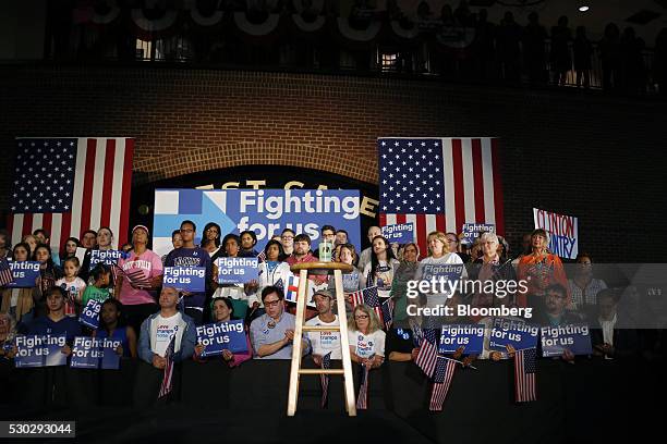 Attendees listen during a campaign event for Hillary Clinton, former Secretary of State and 2016 Democratic presidential candidate, not pictured, in...