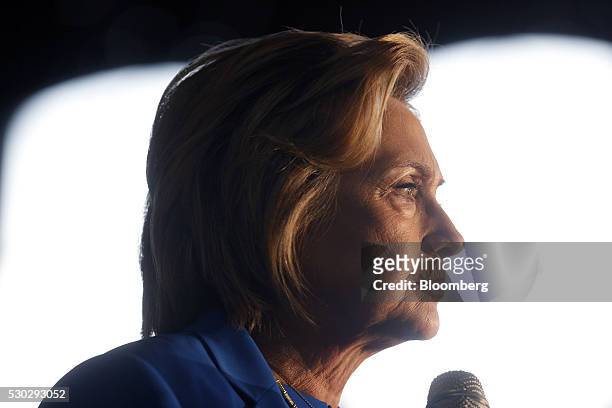 Hillary Clinton, former Secretary of State and 2016 Democratic presidential candidate, pauses while speaking during a campaign event in Louisville,...