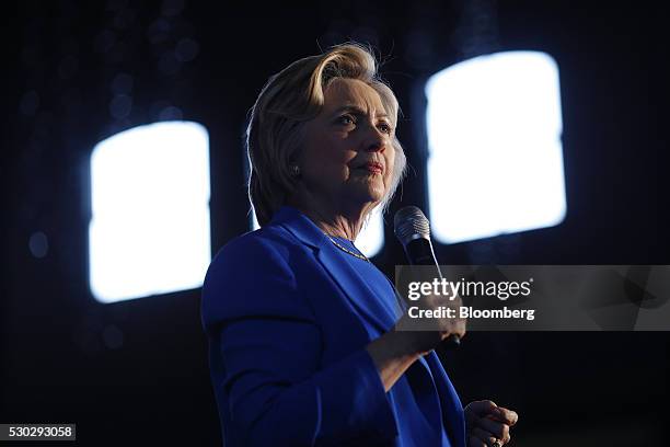 Hillary Clinton, former Secretary of State and 2016 Democratic presidential candidate, pauses while speaking during a campaign event in Louisville,...