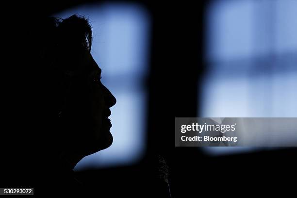 The silhouette of Hillary Clinton, former Secretary of State and 2016 Democratic presidential candidate, is seen during a campaign event in...