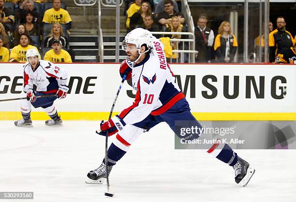 Mike Richards of the Washington Capitals takes a shot in the first period against the Pittsburgh Penguins in Game Six of the Eastern Conference...