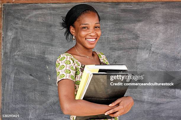 portrait of a woman teacher - commerceandculturestock stock pictures, royalty-free photos & images