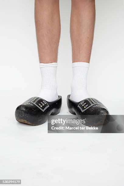 typical dutchman - men in white socks 個照片及圖片檔