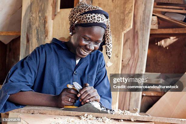 a woman carpenter working - commerceandculturestock stock pictures, royalty-free photos & images