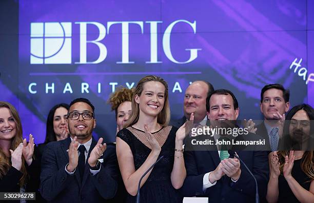 Petra Nemcova BTIG Managing Director Peter Terrant and VP of NASDAQ , David Wicks ring Nasdaq Closing Bell for Charity Day at NASDAQ on May 10, 2016...