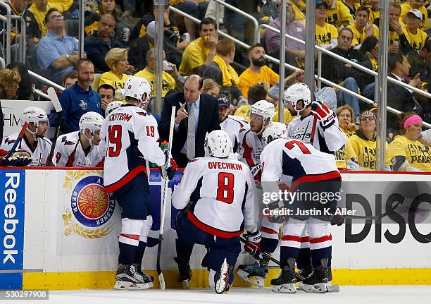 Assistant coach Todd Reirden of the Washington Capitals talks to the power play unit during a time-out against the Pittsburgh Penguins in Game Six of...