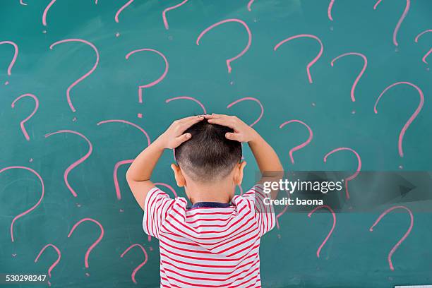 thinking for solution - student thinking stock pictures, royalty-free photos & images
