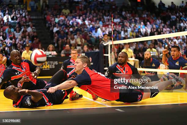 Member of the United Kingdom team dives for the ball during the Invictus Games Orlando 2016 Sitting Volleyball Gold Medal Match at the ESPN Wide...