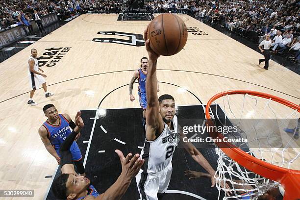 Tim Duncan of the San Antonio Spurs goes to the basket against the Oklahoma City Thunder in Game Five of the Western Conference Semifinals during the...